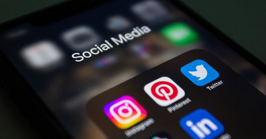 pexels photo 15406294 15406294 A smartphone screen displaying popular social media applications like Instagram and Twitter.